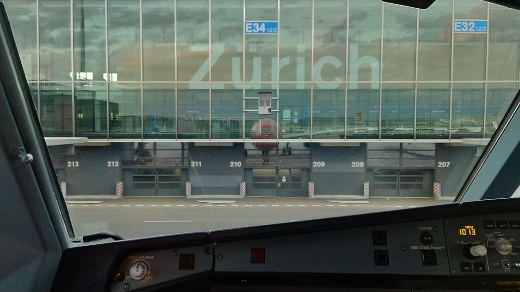 Gate 34 at Zurich Airport, photographed from the cockpit of an aircraft.