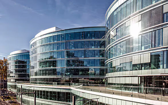 GICHD headquarters in Geneva, a glass building.