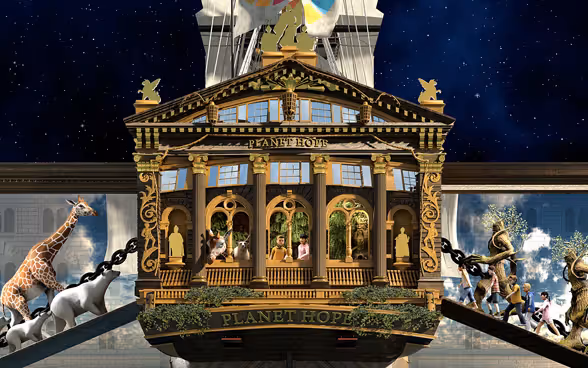 An image is projected on the facade of the Federal Palace: on the dome the flag with the symbol of Agenda 2030; the Planet Hope flag and on the sides animals and children.