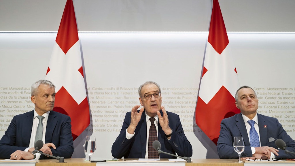 President of the Confederation Guy Parmelin speaks alongside Federal Councillors Ignazio Cassis and Beat Jans at a press conference on the dispatch linked to the Switzerland-EU Package on Friday, 13 March 2026.