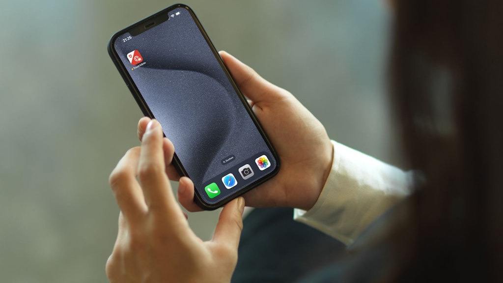 A woman operating a smartphone