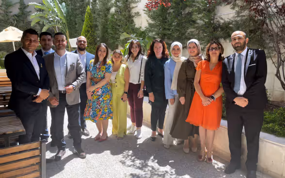 Group photo of MEM Summit youth participants with Ambassador Tissafi.