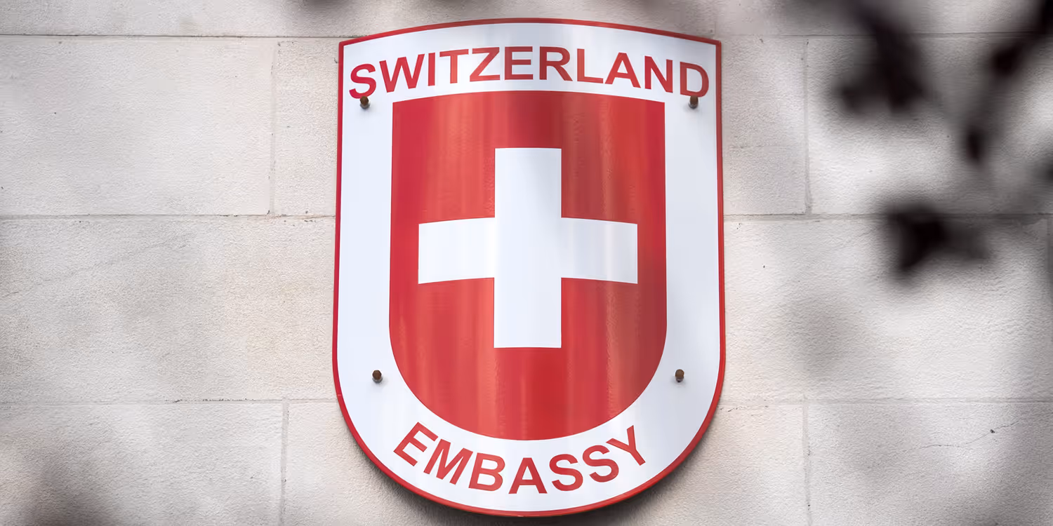 Sign that reads Switzerland Embassy 