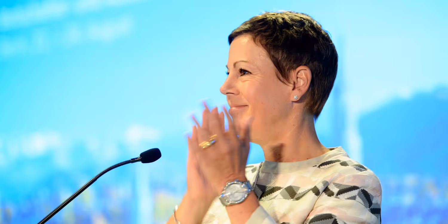 Krystyna Marty, EDA State Secretary a.i., is standing in front of the microphone during a speech.