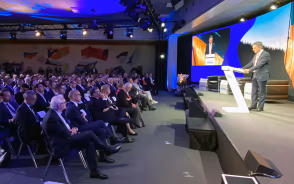 Ignazio Cassis prononce son discours au symposium de Saint-Gall.