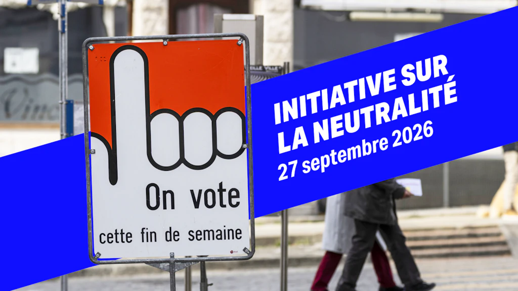Photo d'un panneau métallique sur lequel on peut lire «Votation ce week-end».
