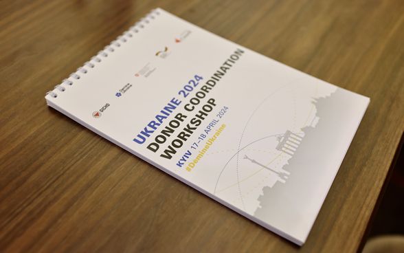 Opuscolo dell'ultimo workshop di coordinamento dei donatori a Kyiv, organizzato dal GICHD.